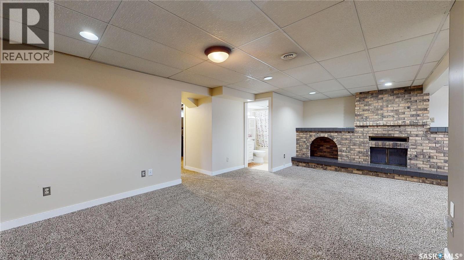 1134 Brown Street, Regina, SK - Indoor Photo Showing Other Room With Fireplace
