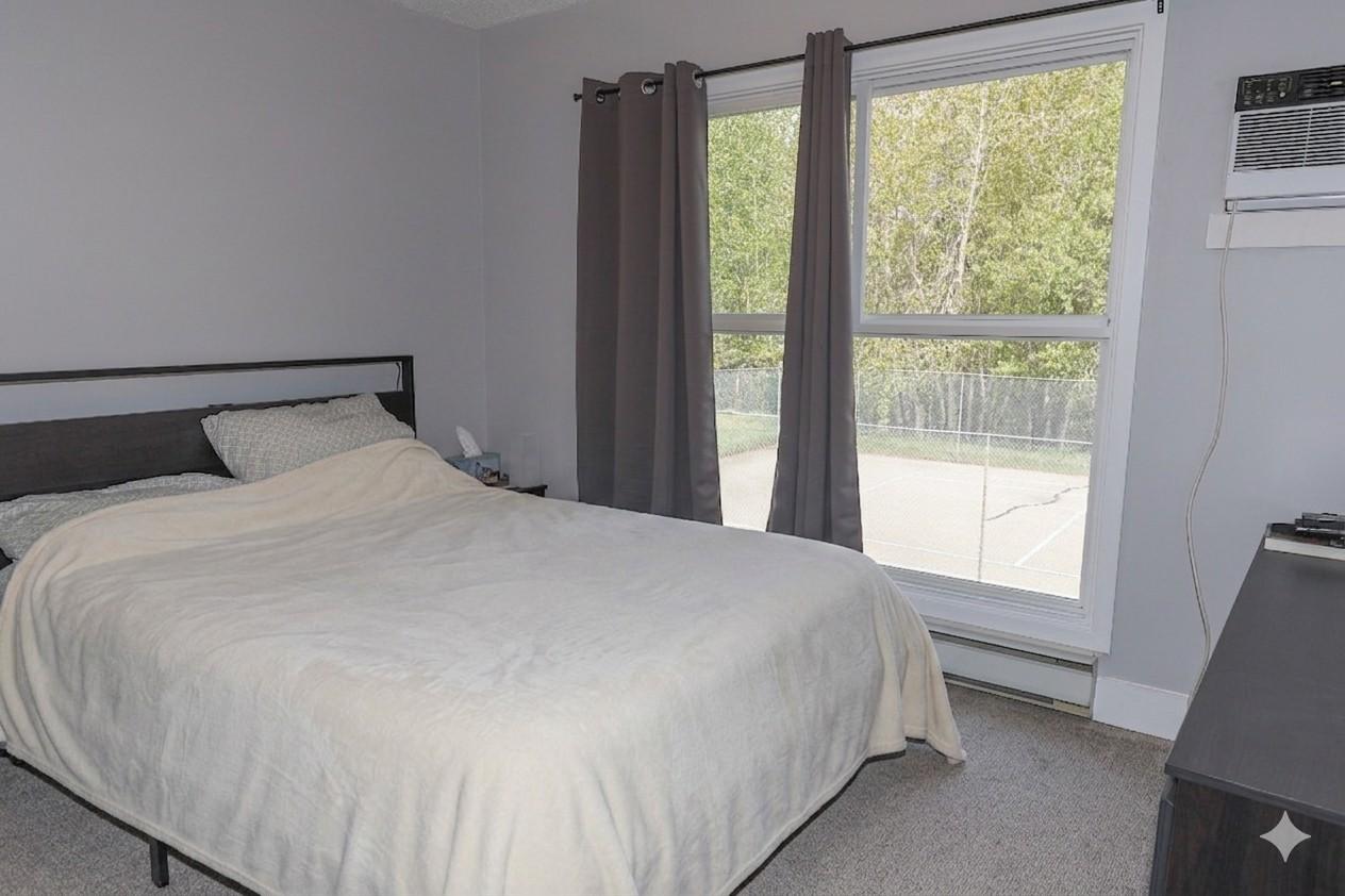 221-223-1051 Gerry Sorensen Way, Kimberley, BC - Indoor Photo Showing Bedroom