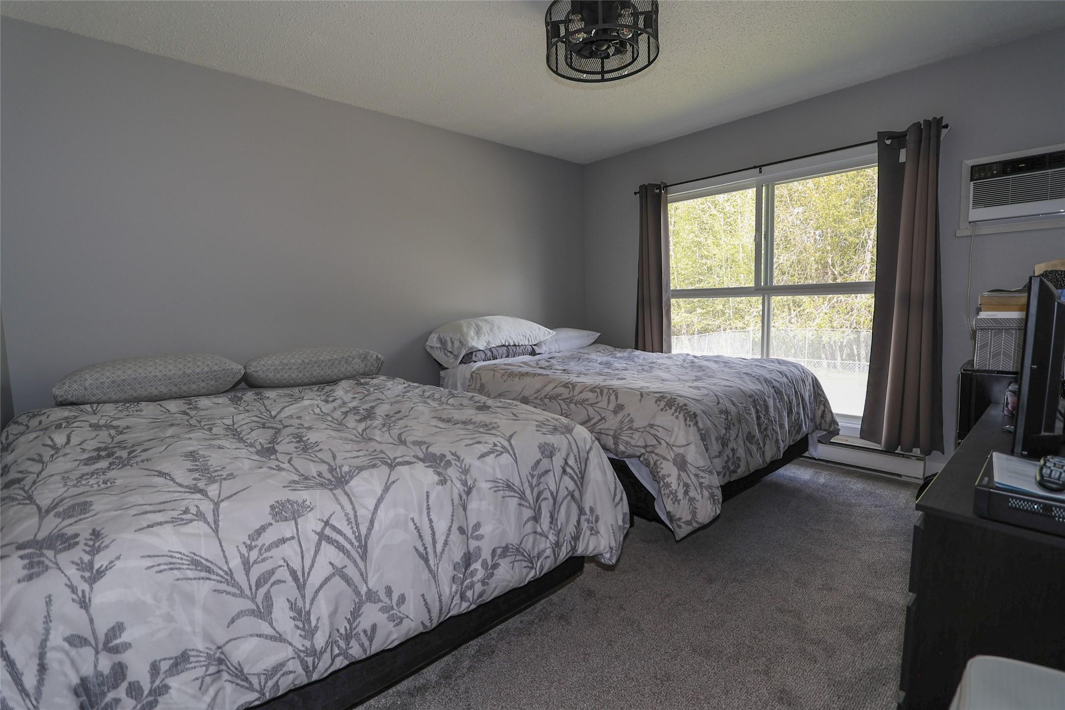 221-223-1051 Gerry Sorensen Way, Kimberley, BC - Indoor Photo Showing Bedroom