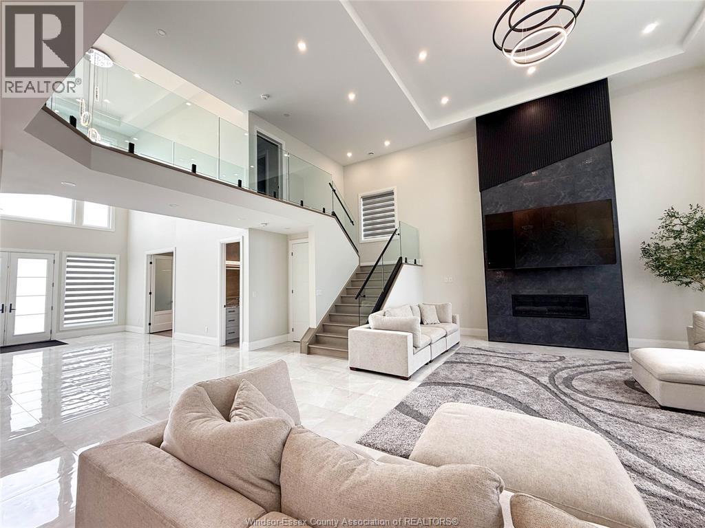 7 Cypress Pointe, Leamington, ON - Indoor Photo Showing Other Room With Fireplace