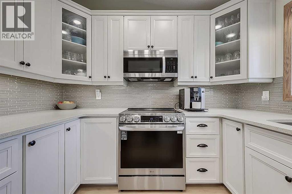 42 Sundown Close Se, Calgary, AB - Indoor Photo Showing Kitchen With Upgraded Kitchen