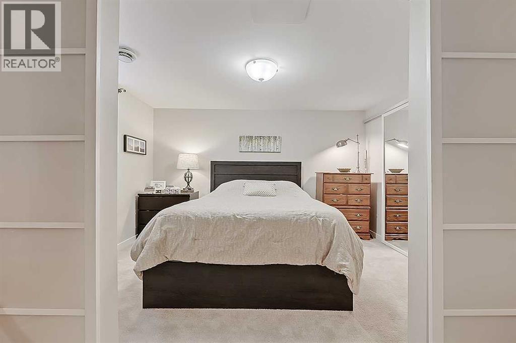 42 Sundown Close Se, Calgary, AB - Indoor Photo Showing Bedroom