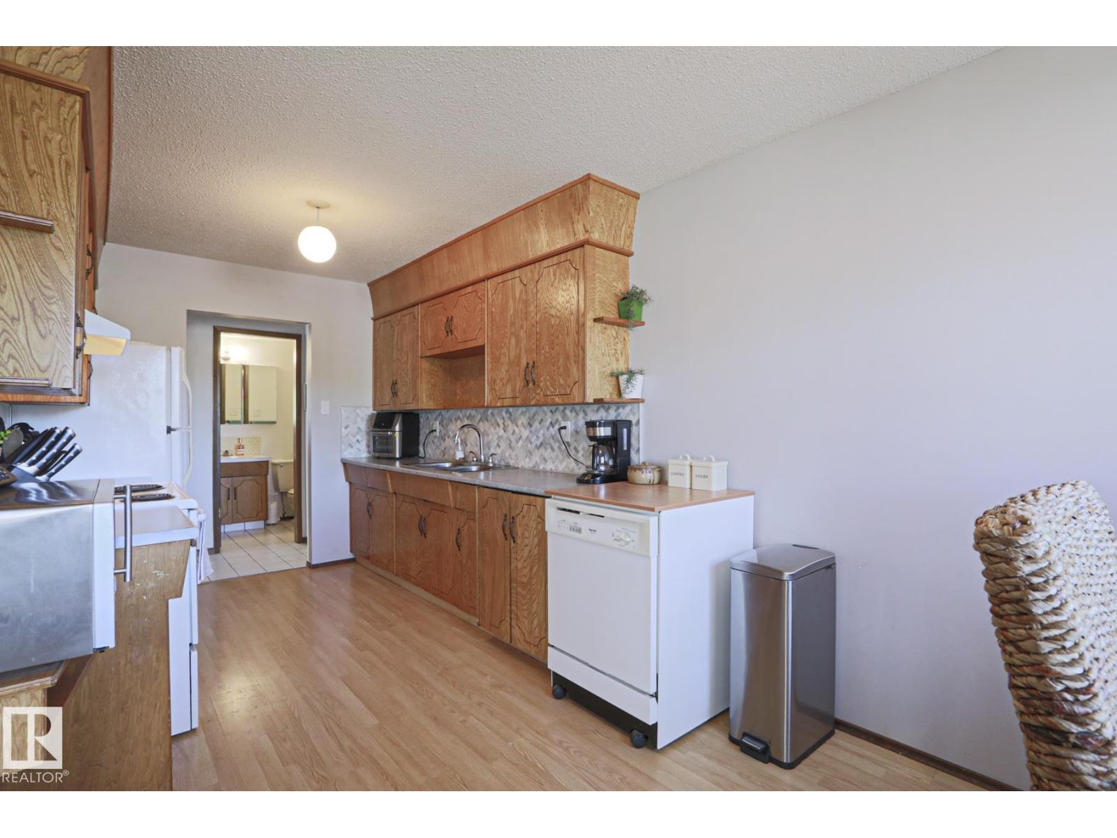 9324 80 Av Nw, Edmonton, AB - Indoor Photo Showing Kitchen With Double Sink