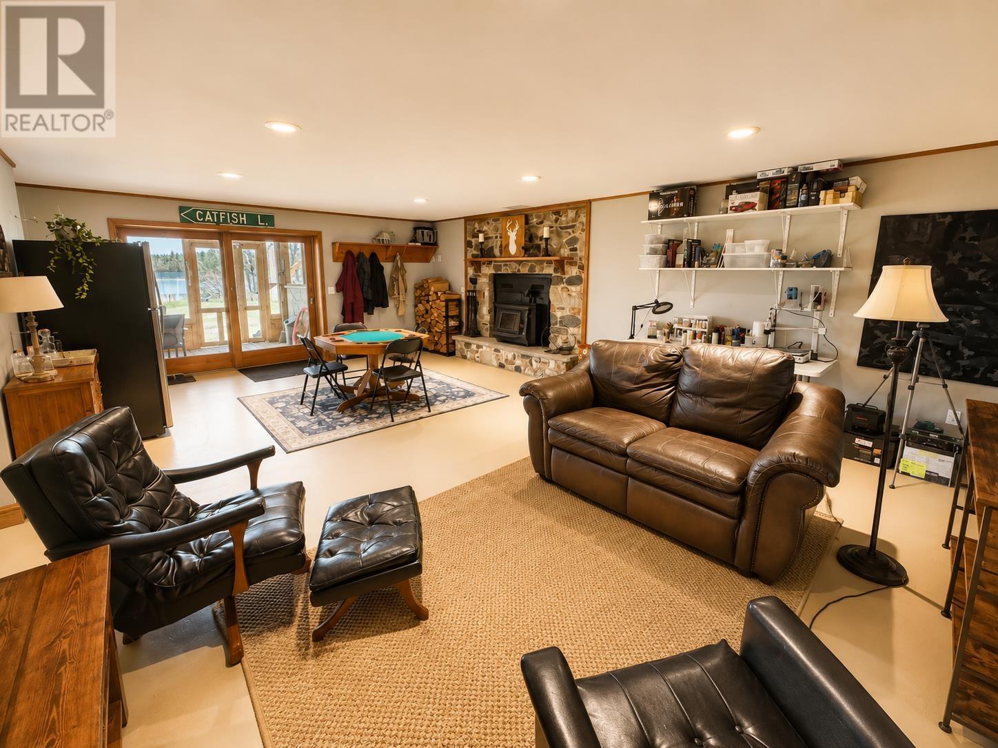 22 Catfish Rd, Wawa, ON - Indoor Photo Showing Living Room With Fireplace