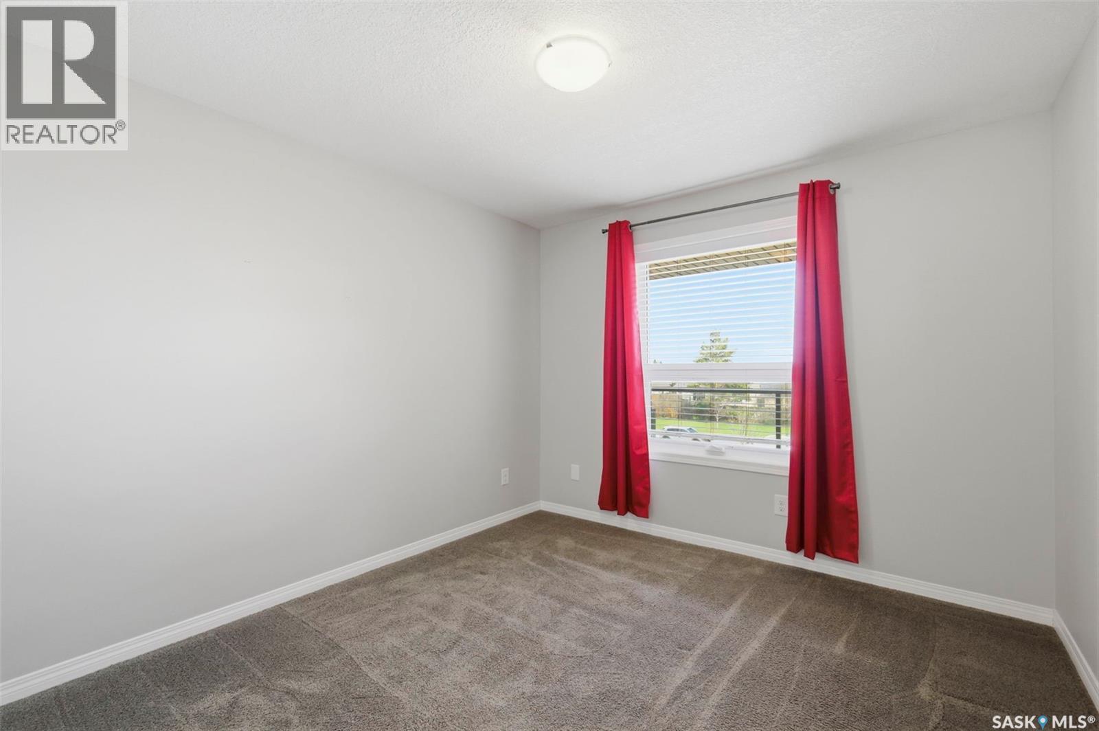 209 915 Kristjanson Road, Saskatoon, SK - Indoor Photo Showing Other Room