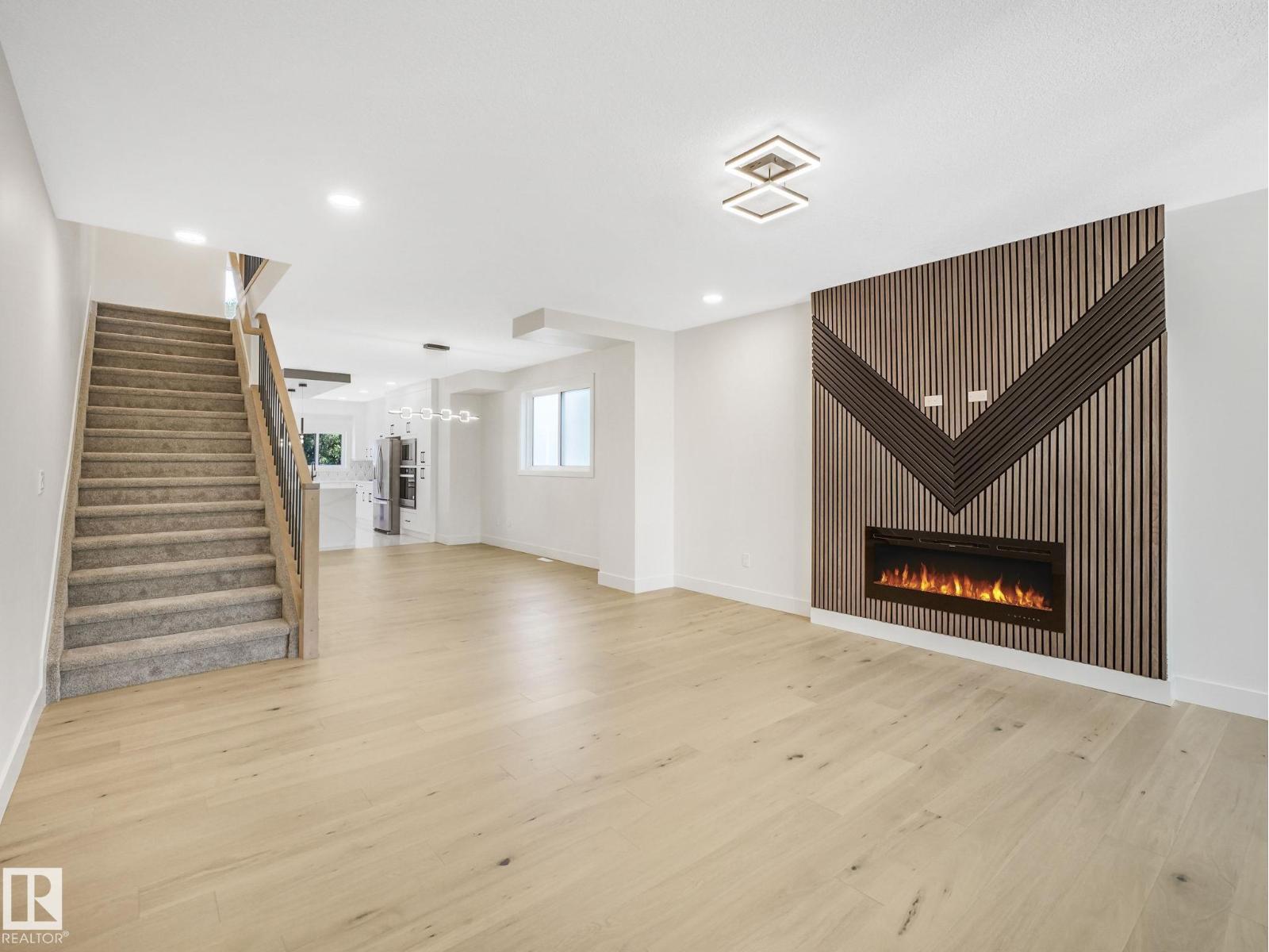 10963 129 St Nw, Edmonton, AB - Indoor With Fireplace