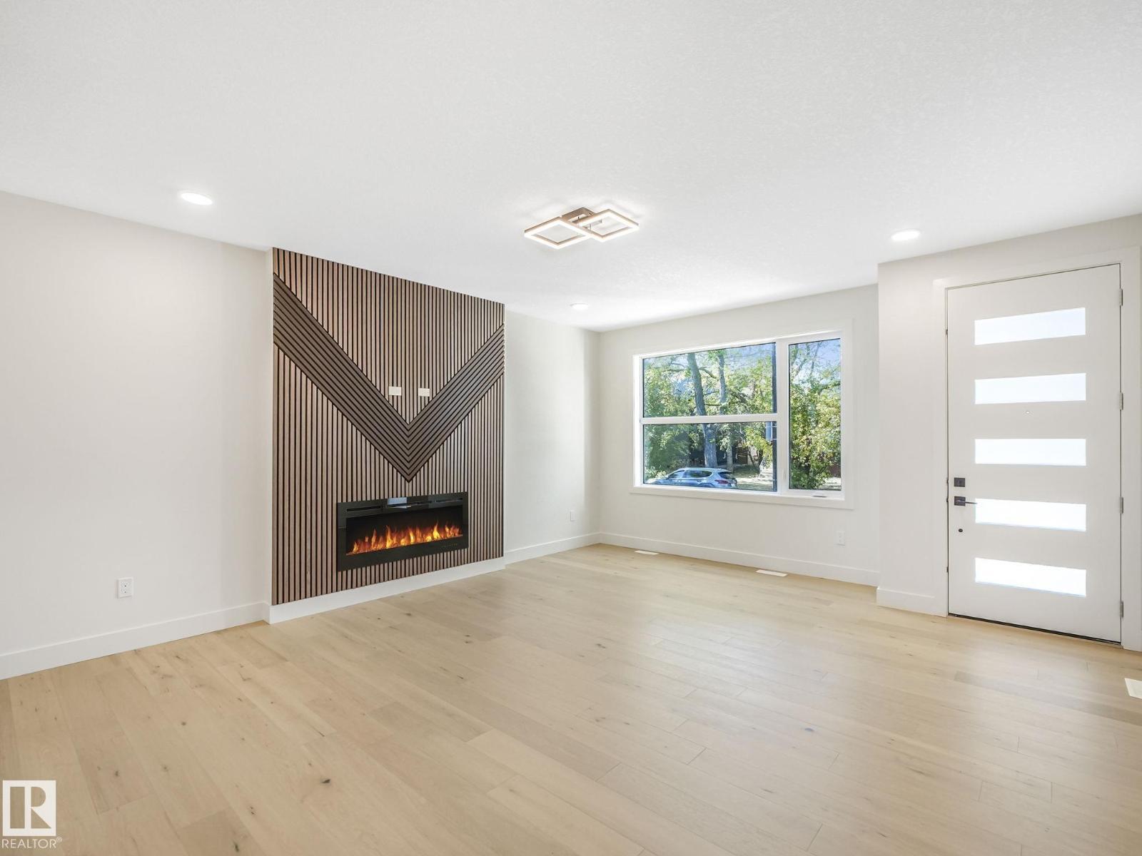 10963 129 St Nw, Edmonton, AB - Indoor Photo Showing Other Room With Fireplace