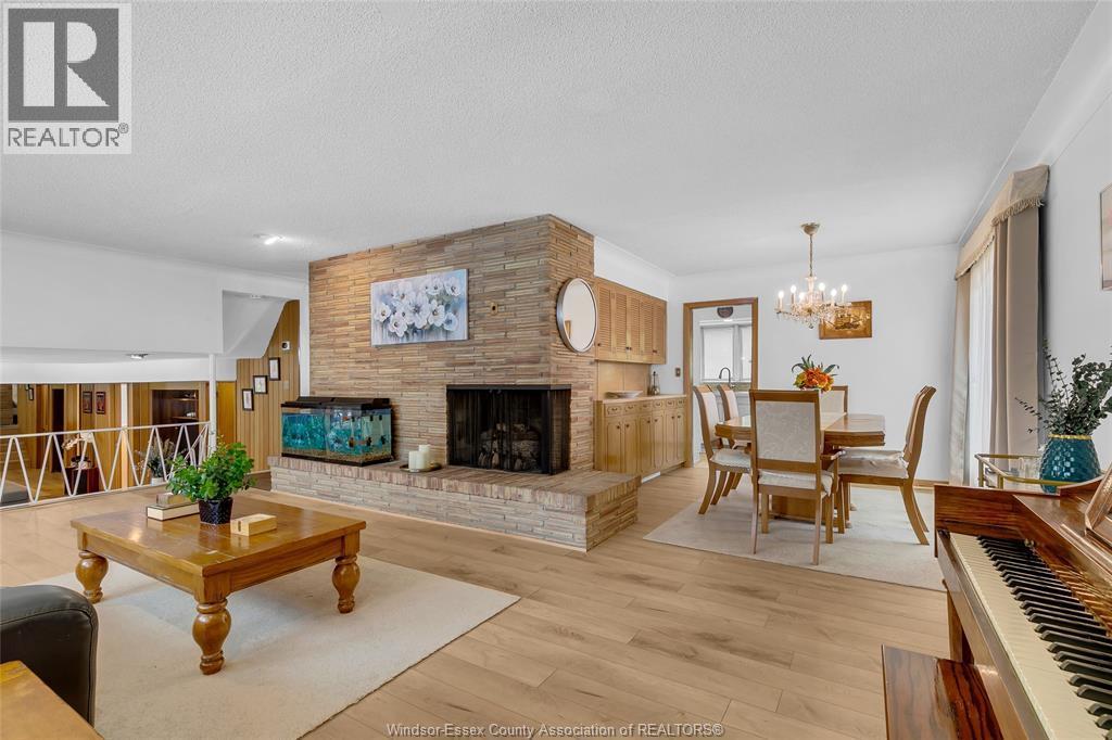 719 Champlain Drive, Windsor, ON - Indoor Photo Showing Living Room With Fireplace