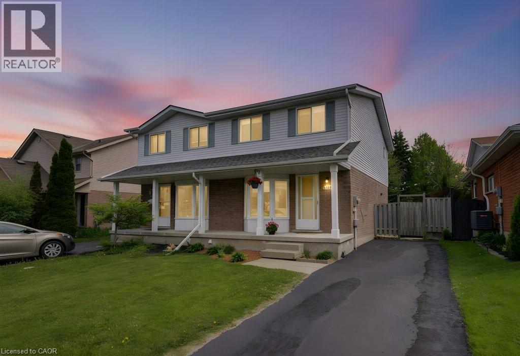 Two-story residence featuring light gray siding and brick accents - 603 Pinerow Crescent Unit# B, Waterloo, ON - Outdoor With Deck Patio Veranda With Facade