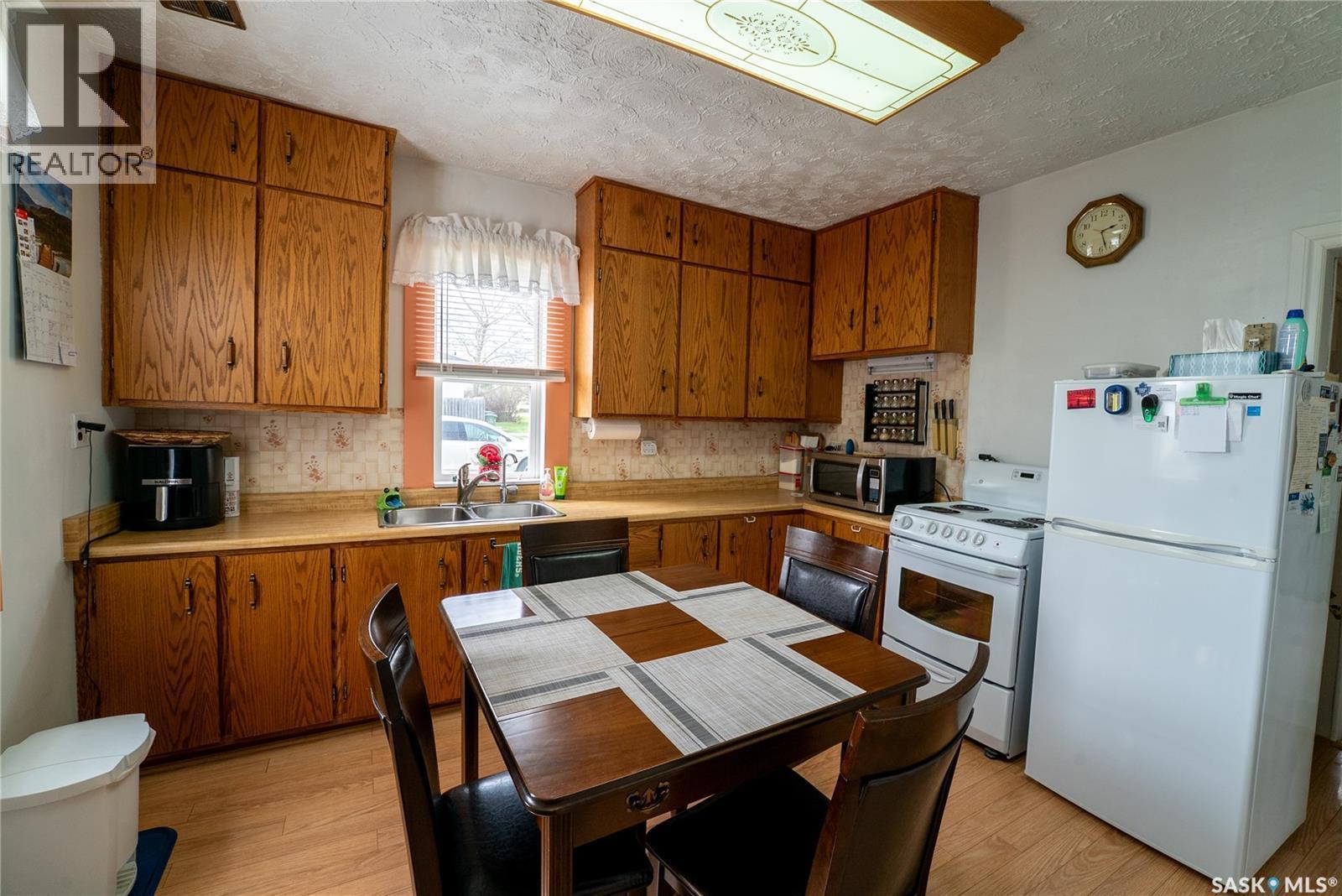 300 Carson Street, Dundurn, SK - Indoor Photo Showing Kitchen With Double Sink
