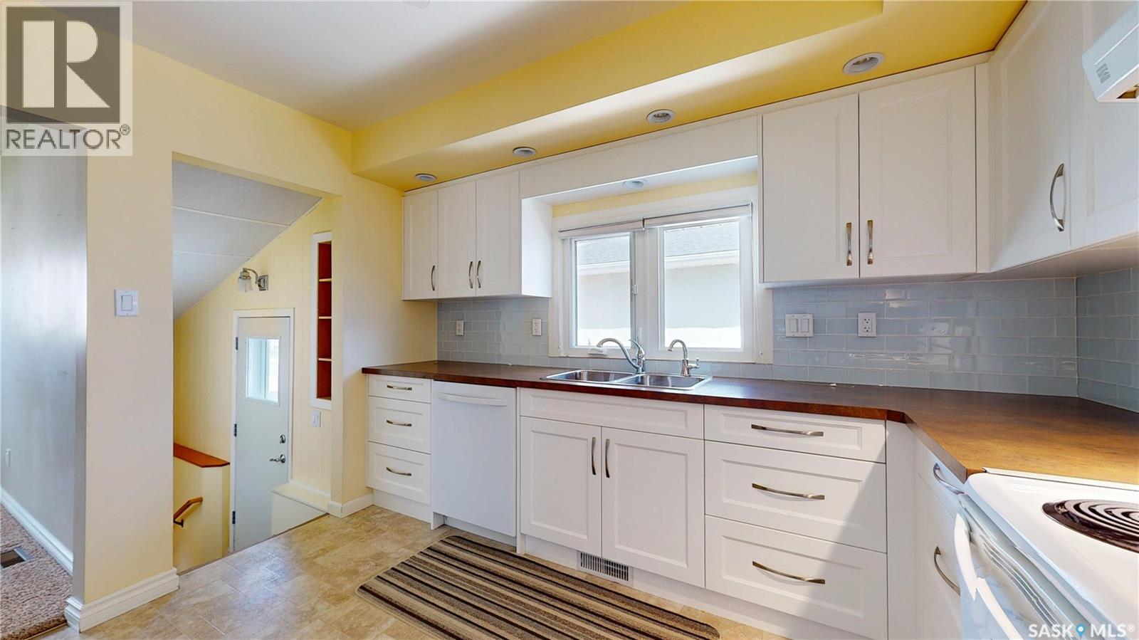 5445 4Th Avenue, Regina, SK - Indoor Photo Showing Kitchen With Double Sink