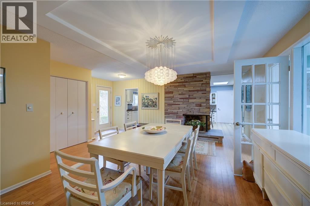 9 Summerhayes Crescent, Brantford, ON - Indoor Photo Showing Dining Room With Fireplace