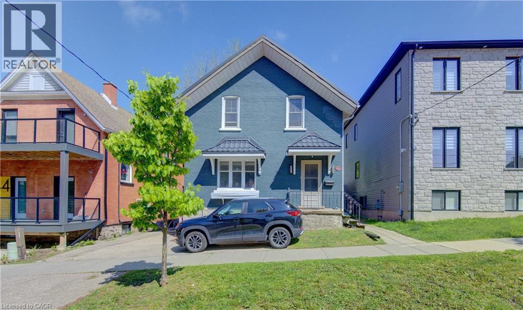 Two-story exterior with a gabled roofline - 48 Breithaupt Street, Kitchener, ON - Outdoor With Facade