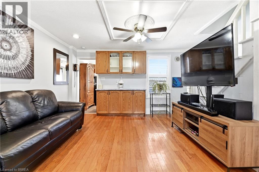 Hardwood flooring throughout the main living space - 23 Britannia Avenue, Hamilton, ON - Indoor