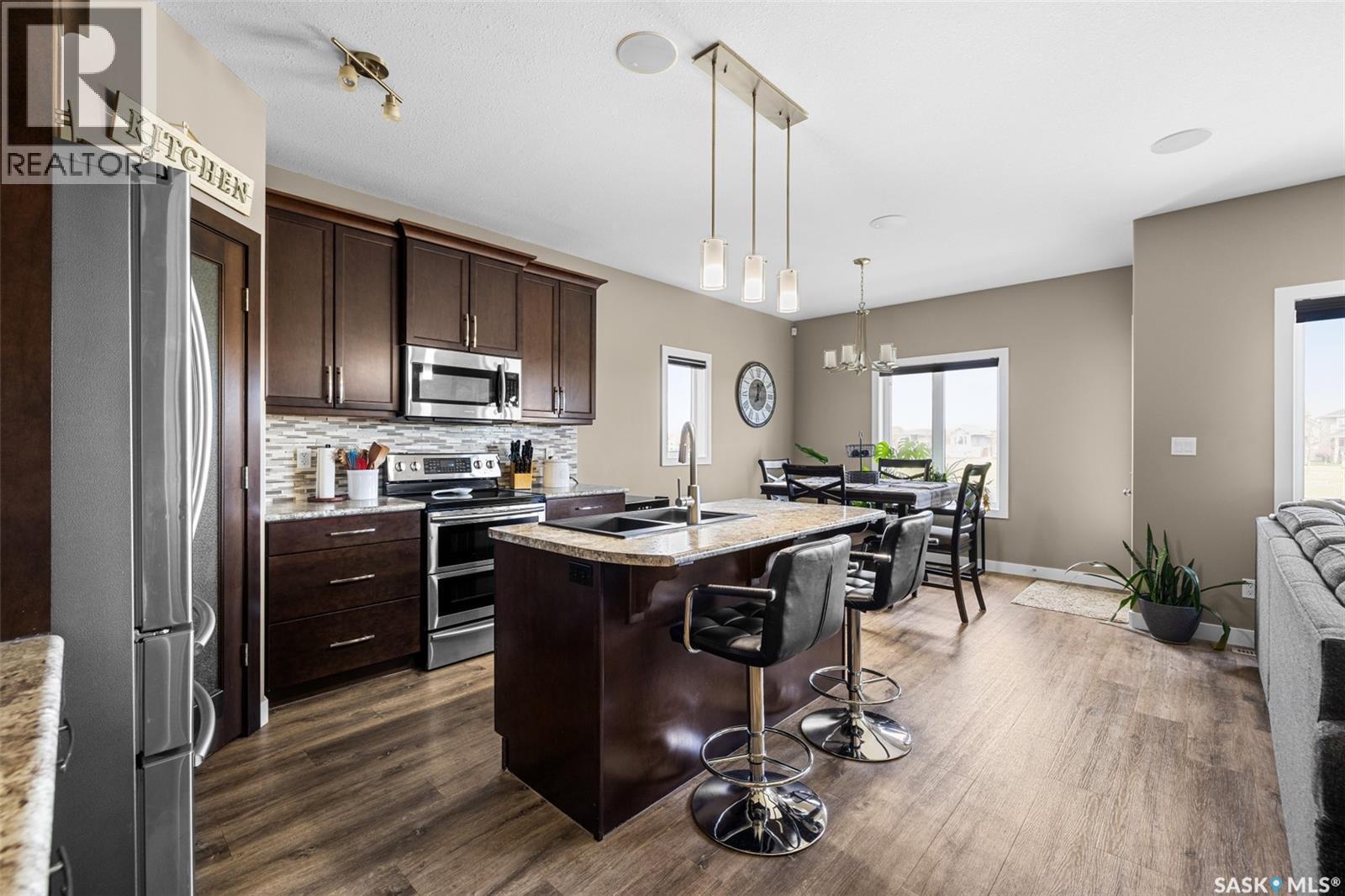 5044 Crane Crescent, Regina, SK - Indoor Photo Showing Kitchen With Double Sink With Upgraded Kitchen