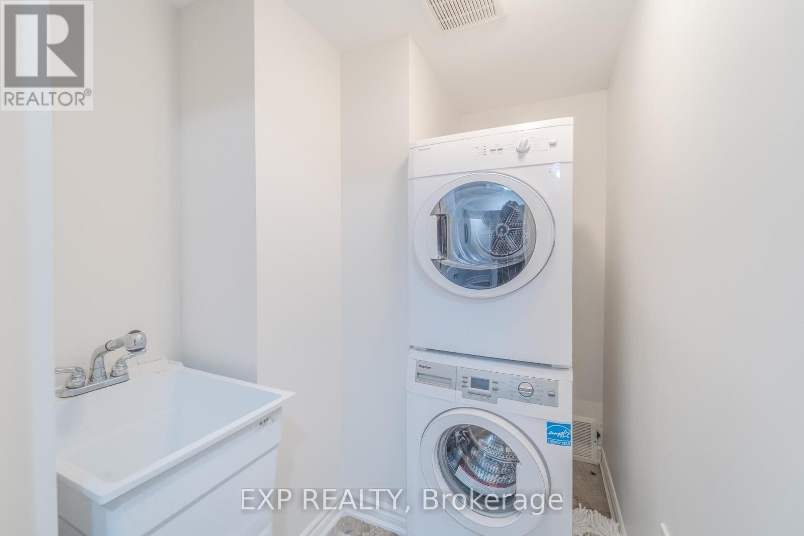 84 - 1000 Asleton Boulevard, Milton, ON - Indoor Photo Showing Laundry Room