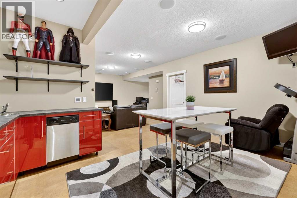 Family/Rec room with wet bar - 44 Elgin Meadows Link Se, Calgary, AB