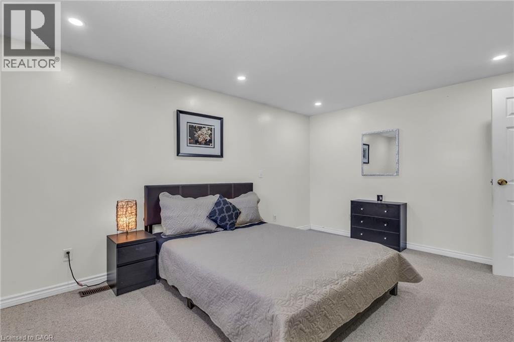 Carpeted bedroom with baseboards and recessed lighting - 146 Bechtel Drive, Kitchener, ON - Indoor Photo Showing Bedroom