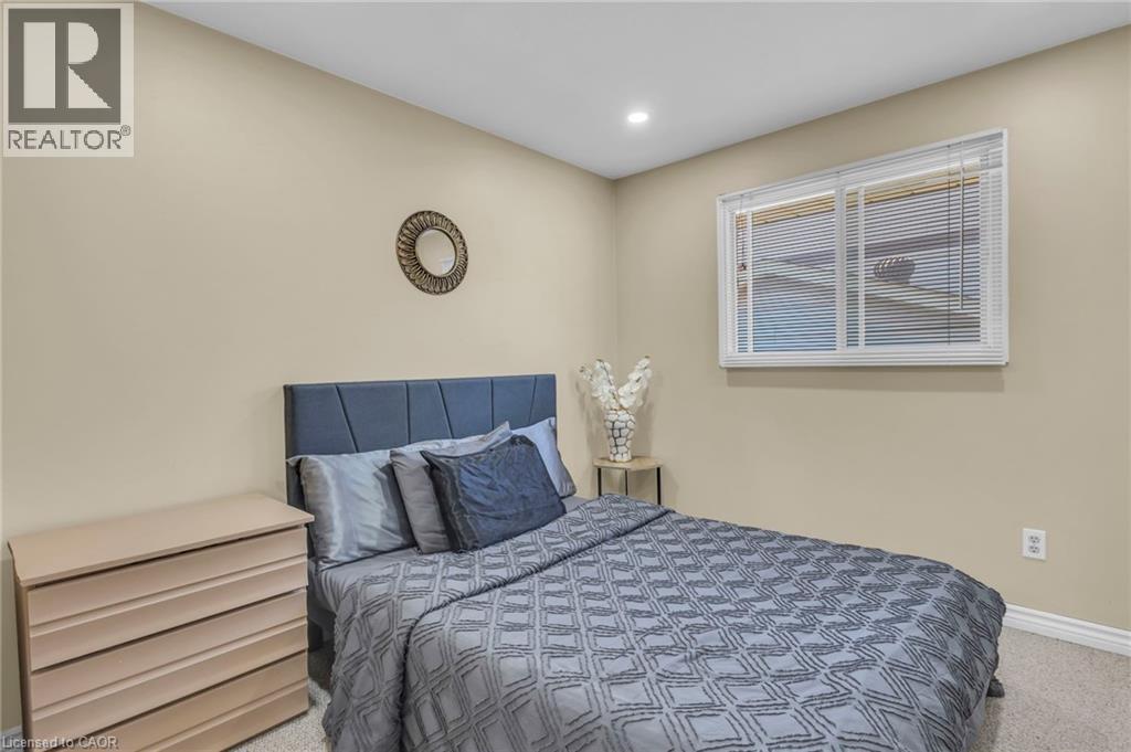 Carpeted bedroom with baseboards and recessed lighting - 146 Bechtel Drive, Kitchener, ON - Indoor Photo Showing Bedroom