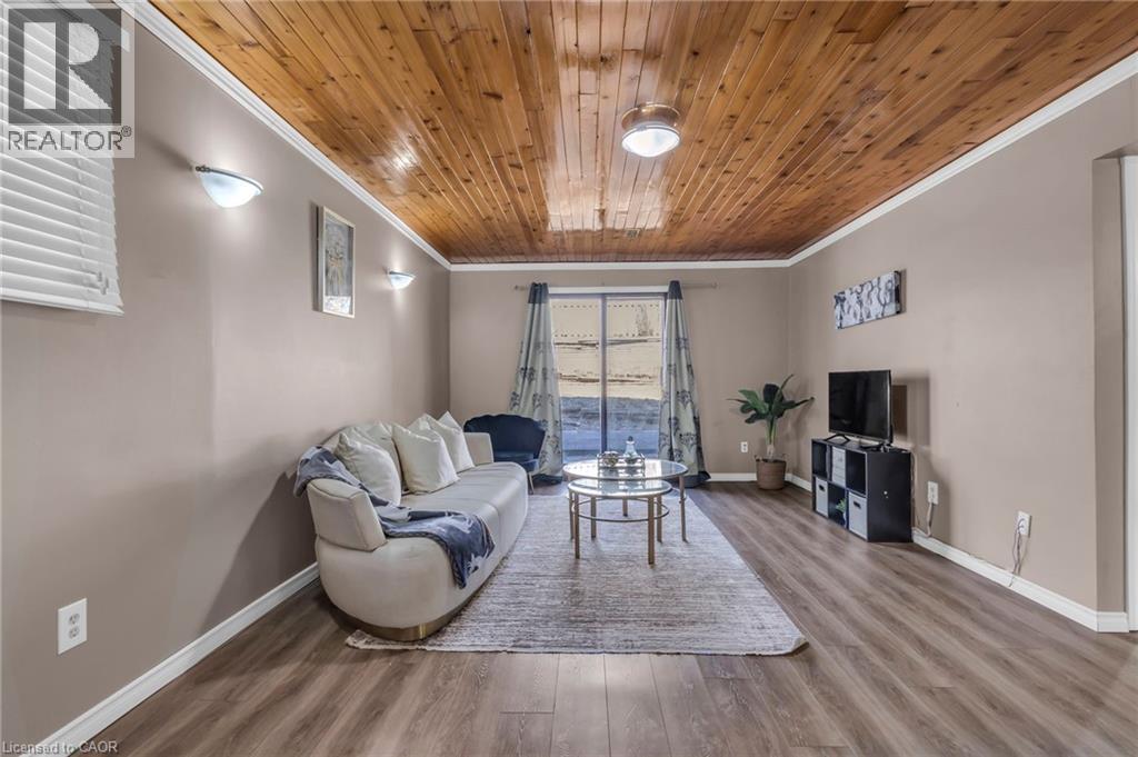 Living room featuring wood finished floors and wooden ceiling - 146 Bechtel Drive, Kitchener, ON - Indoor Photo Showing Living Room
