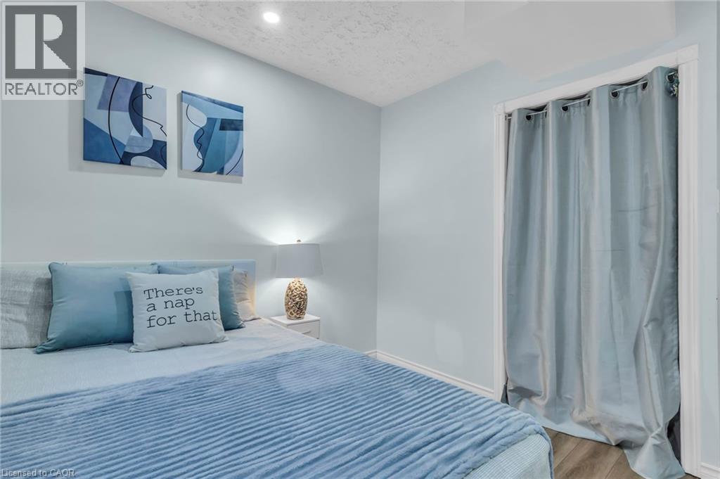 Bedroom with a textured ceiling and wood finished floors - 146 Bechtel Drive, Kitchener, ON - Indoor Photo Showing Bedroom