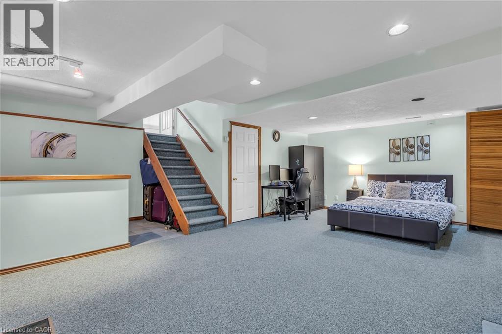 Carpeted bedroom featuring an office area and recessed lighting - 146 Bechtel Drive, Kitchener, ON - Indoor Photo Showing Bedroom