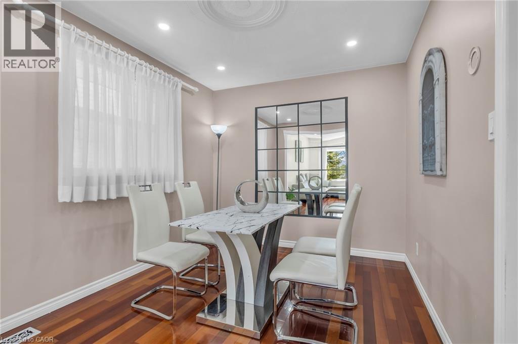 Dining room with recessed lighting and dark wood-style flooring - 146 Bechtel Drive, Kitchener, ON - Indoor Photo Showing Dining Room
