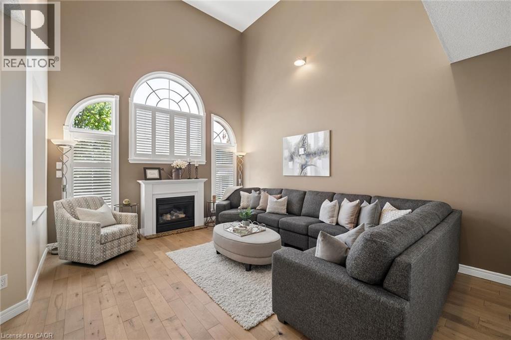 697 Breakwater Crescent, Waterloo, ON - Indoor Photo Showing Living Room With Fireplace