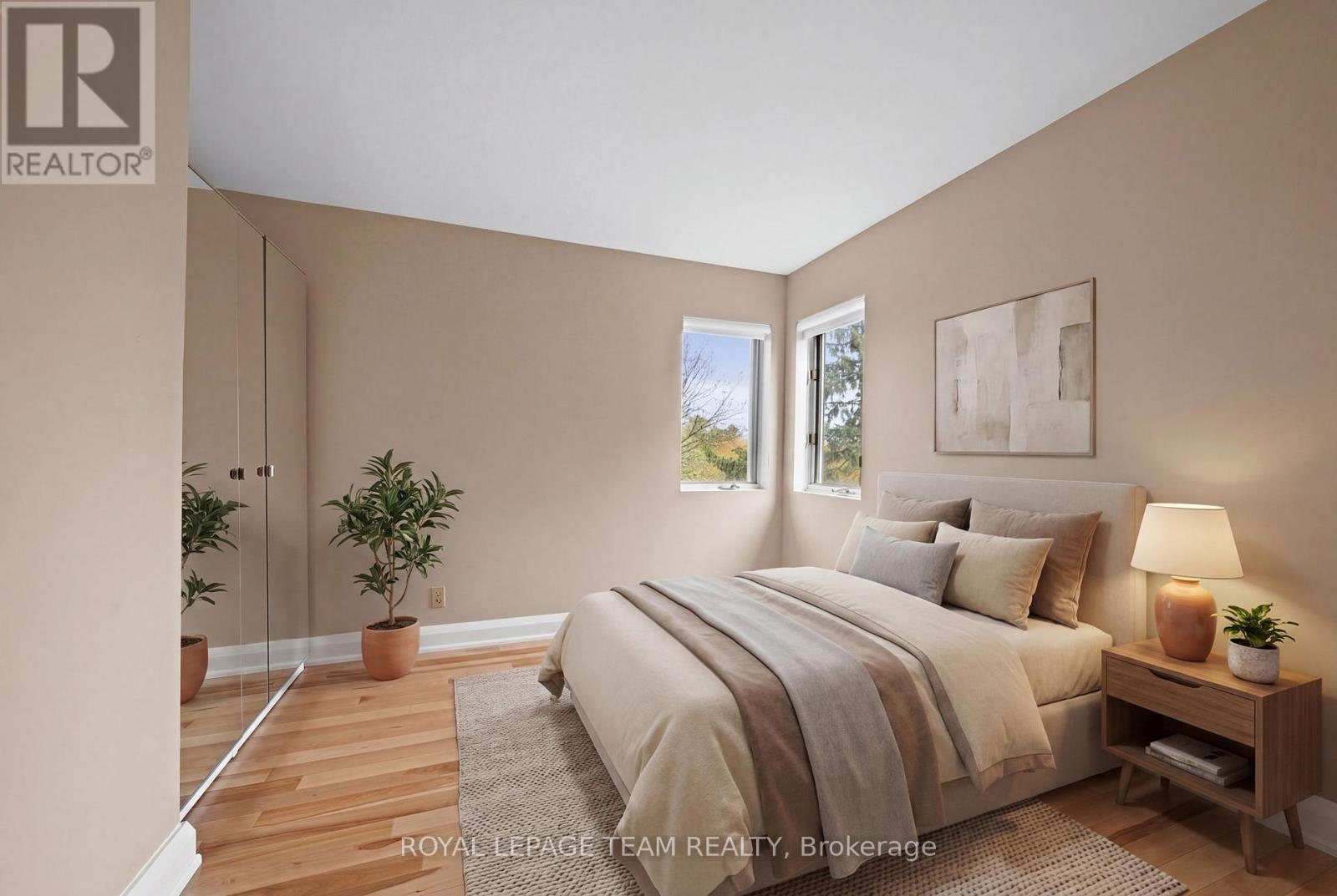 This photograph has been virtually staged. - 1965 Bromley Road, Ottawa, ON - Indoor Photo Showing Bedroom