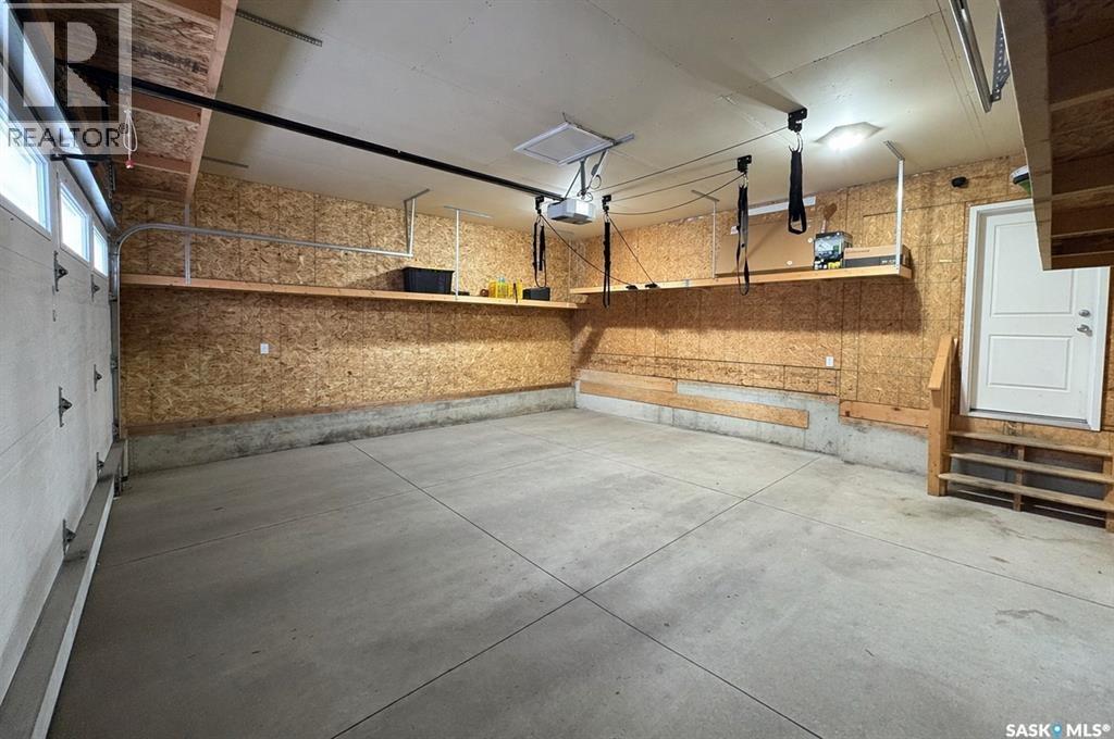 4301 Green Poplar Lane, Regina, SK - Indoor Photo Showing Garage