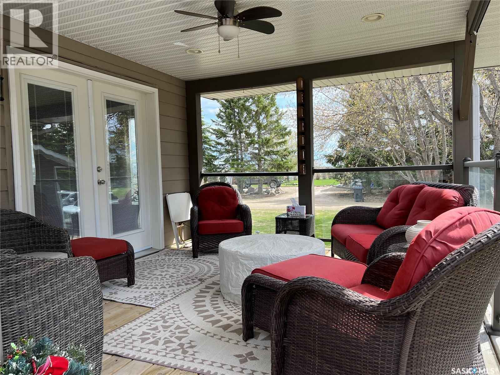 208 2Nd Avenue Se, Dorintosh, SK - Outdoor With Deck Patio Veranda With Exterior