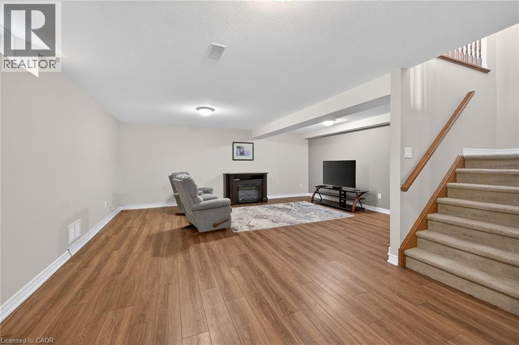 9 Grovetree Trail, Hamilton, ON - Indoor With Fireplace