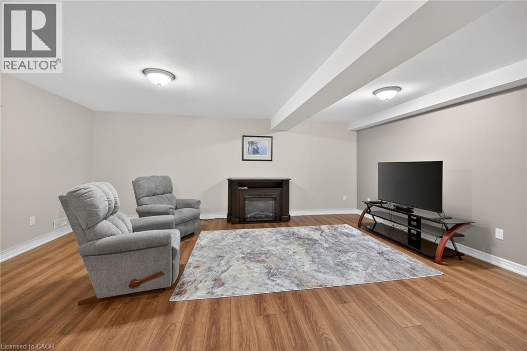 9 Grovetree Trail, Hamilton, ON - Indoor Photo Showing Living Room With Fireplace