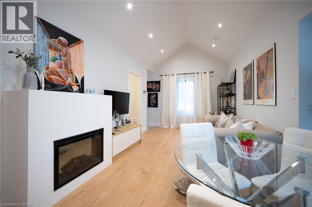 236 Macaulay Street E, Hamilton, ON - Indoor Photo Showing Other Room With Fireplace