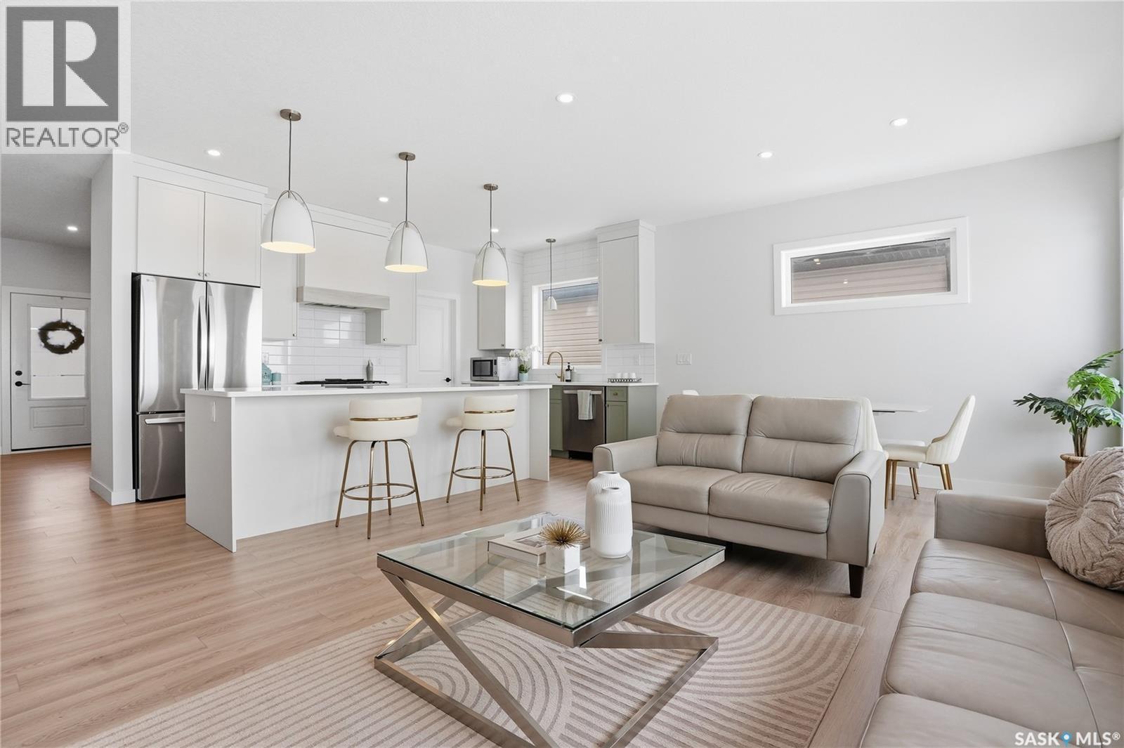 20 515 Delainey Road, Saskatoon, SK - Indoor Photo Showing Living Room