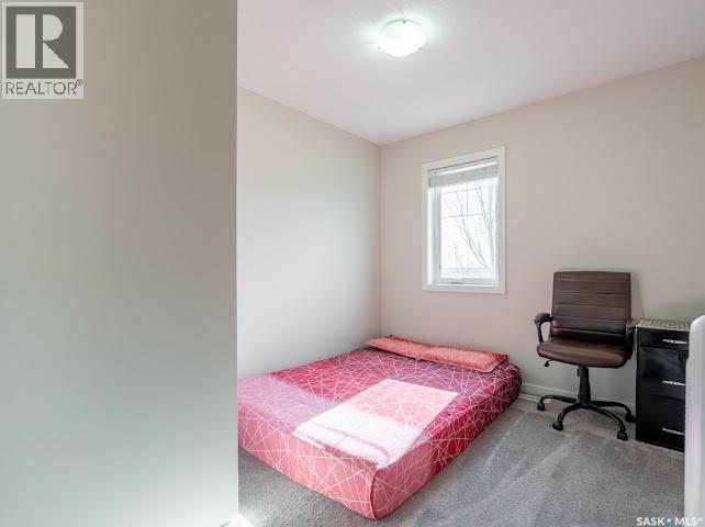 9 5752 Gordon Road, Regina, SK - Indoor Photo Showing Bedroom