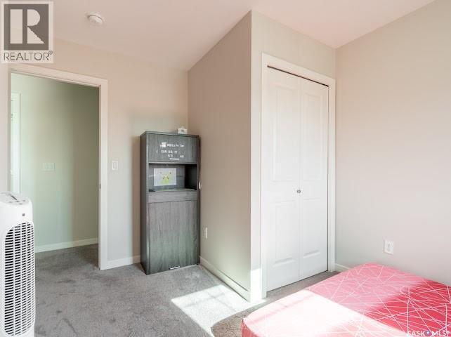 9 5752 Gordon Road, Regina, SK - Indoor Photo Showing Bedroom