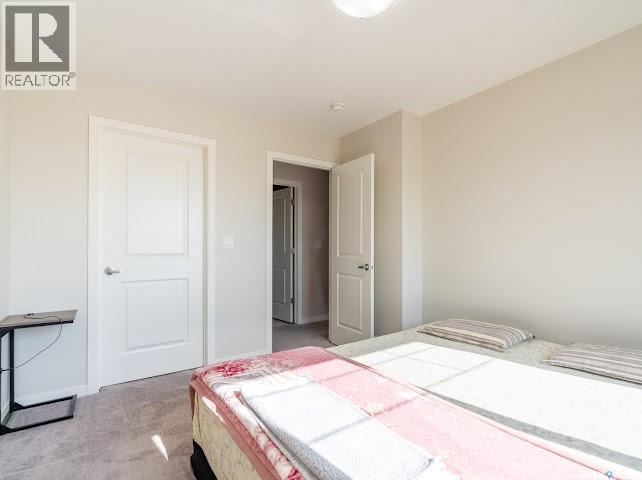 9 5752 Gordon Road, Regina, SK - Indoor Photo Showing Bedroom