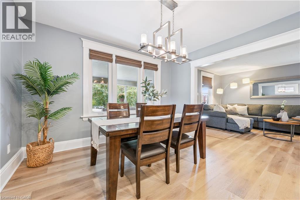 Open-concept dining area with light wood-finish flooring - 310 Kitchener Road, Cambridge, ON - Indoor Photo Showing Dining Room