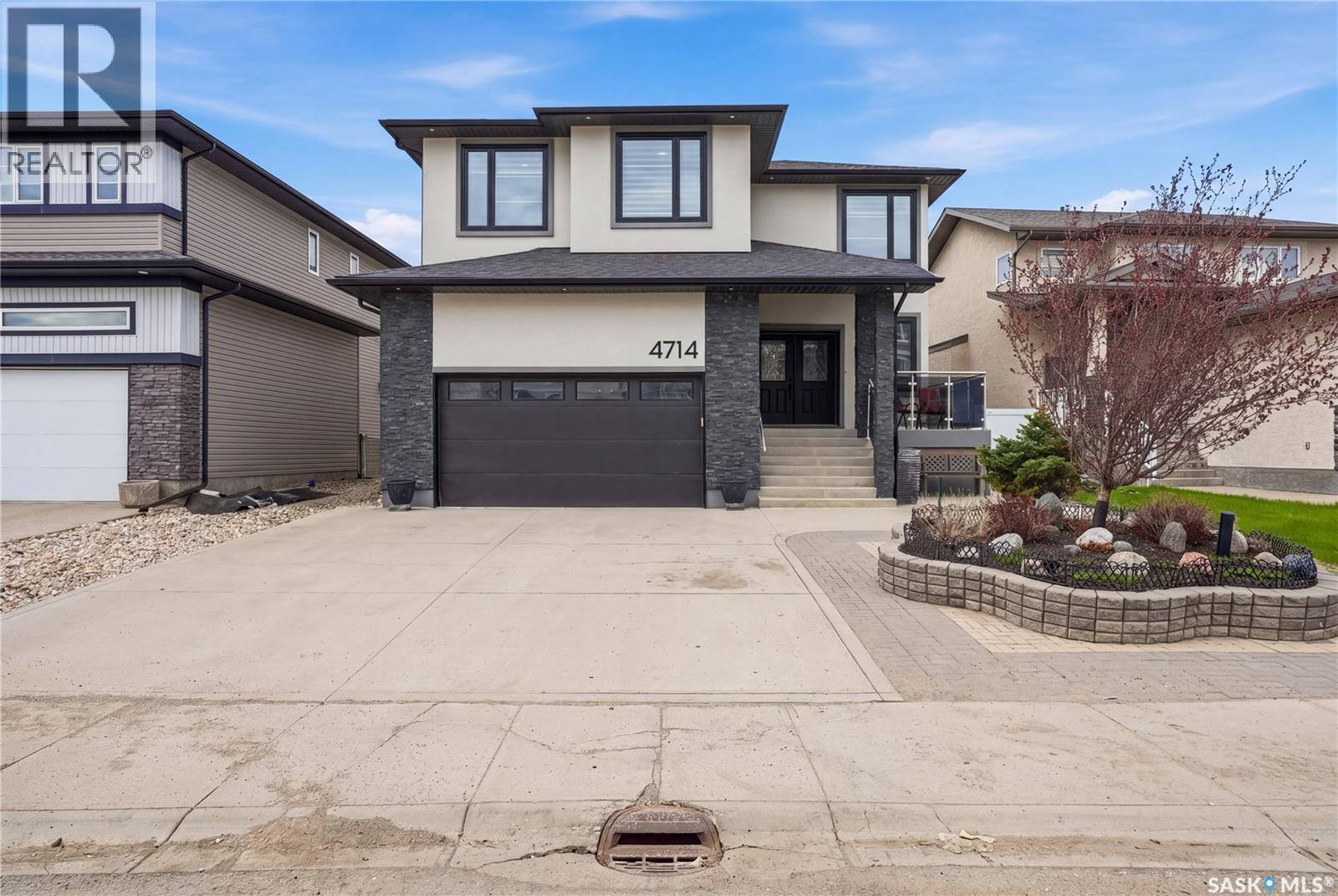 4714 E Green Apple Drive, Regina, SK - Outdoor With Facade