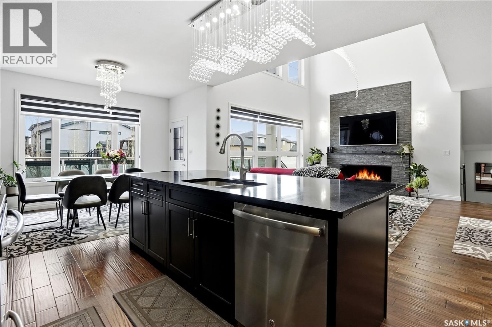 4714 E Green Apple Drive, Regina, SK - Indoor With Fireplace