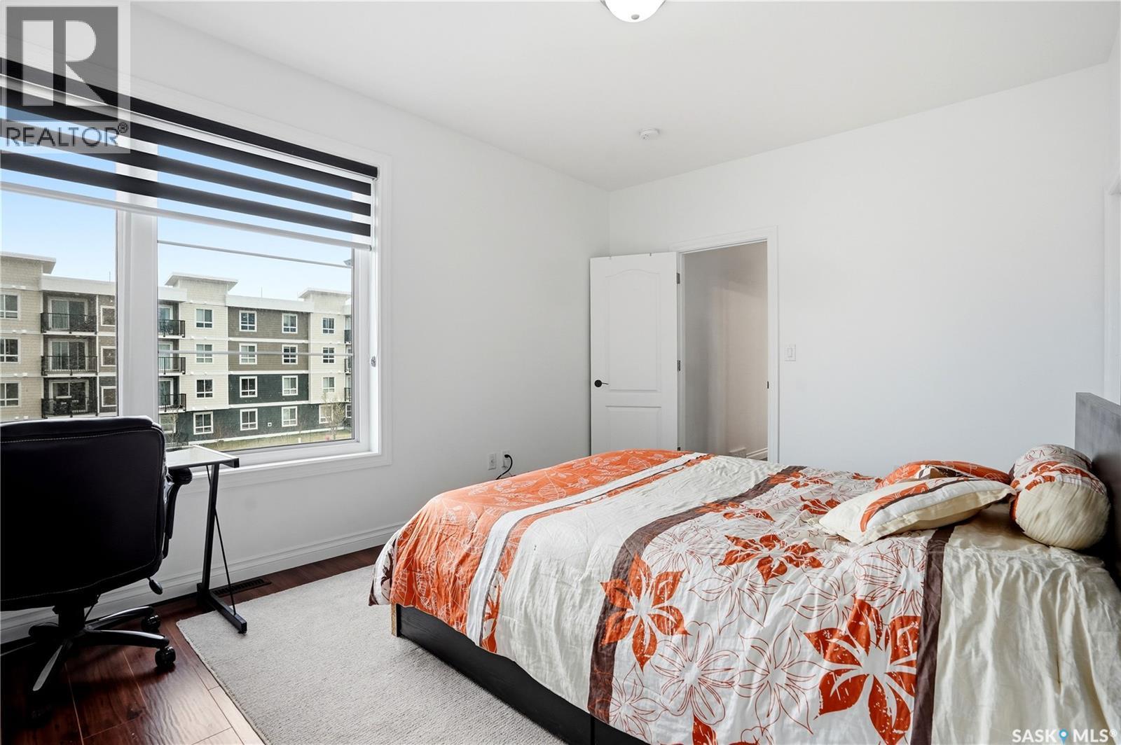 4714 E Green Apple Drive, Regina, SK - Indoor Photo Showing Bedroom