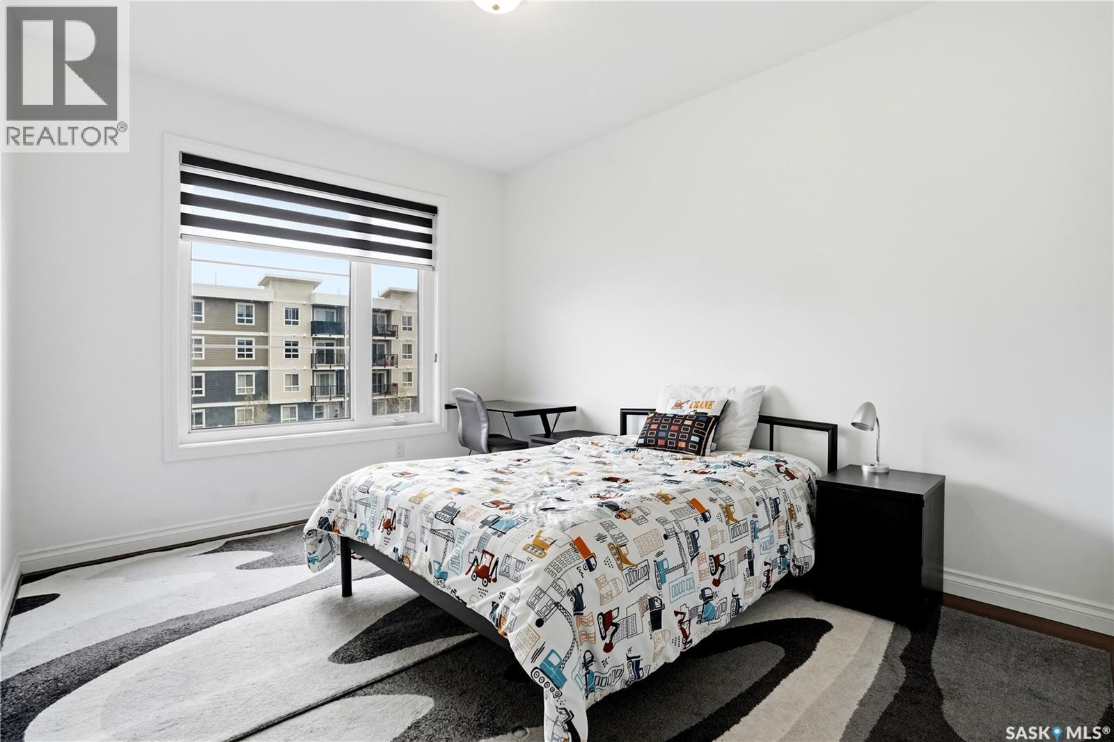 4714 E Green Apple Drive, Regina, SK - Indoor Photo Showing Bedroom