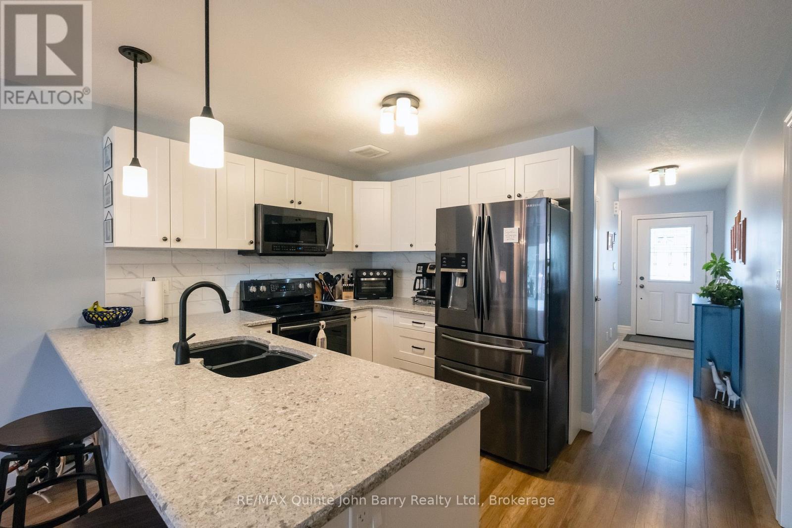49 Mcintosh Crescent, Quinte West (Murray Ward), ON - Indoor Photo Showing Kitchen With Double Sink