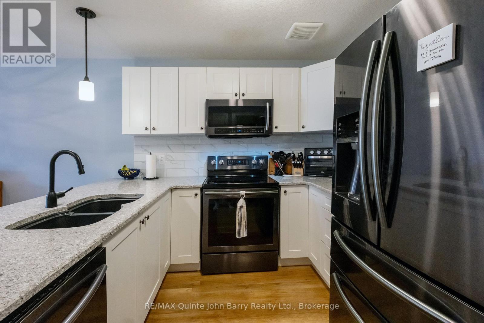 49 Mcintosh Crescent, Quinte West (Murray Ward), ON - Indoor Photo Showing Kitchen With Double Sink