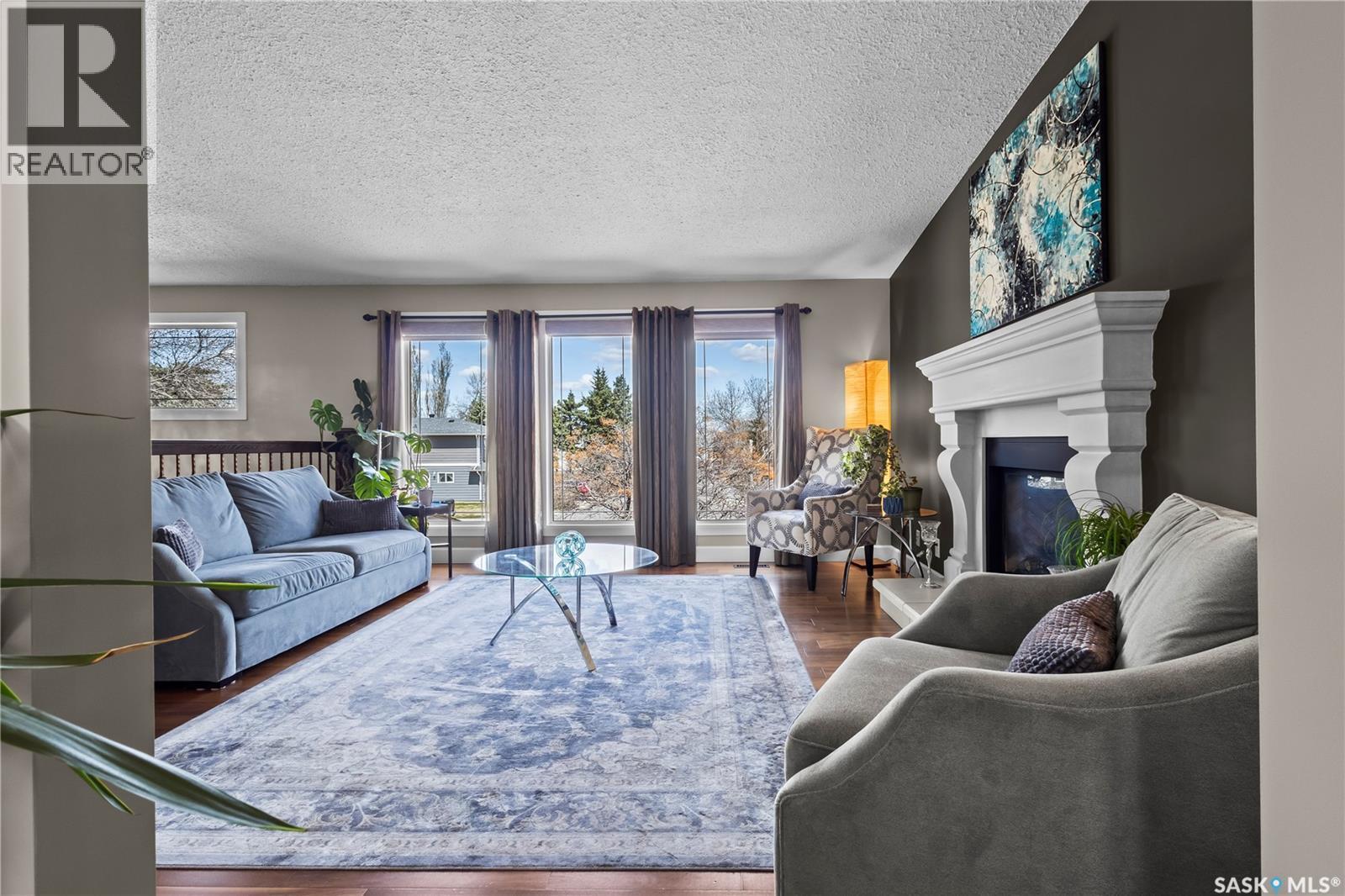 3383 Dent Crescent, Prince Albert, SK - Indoor Photo Showing Living Room With Fireplace