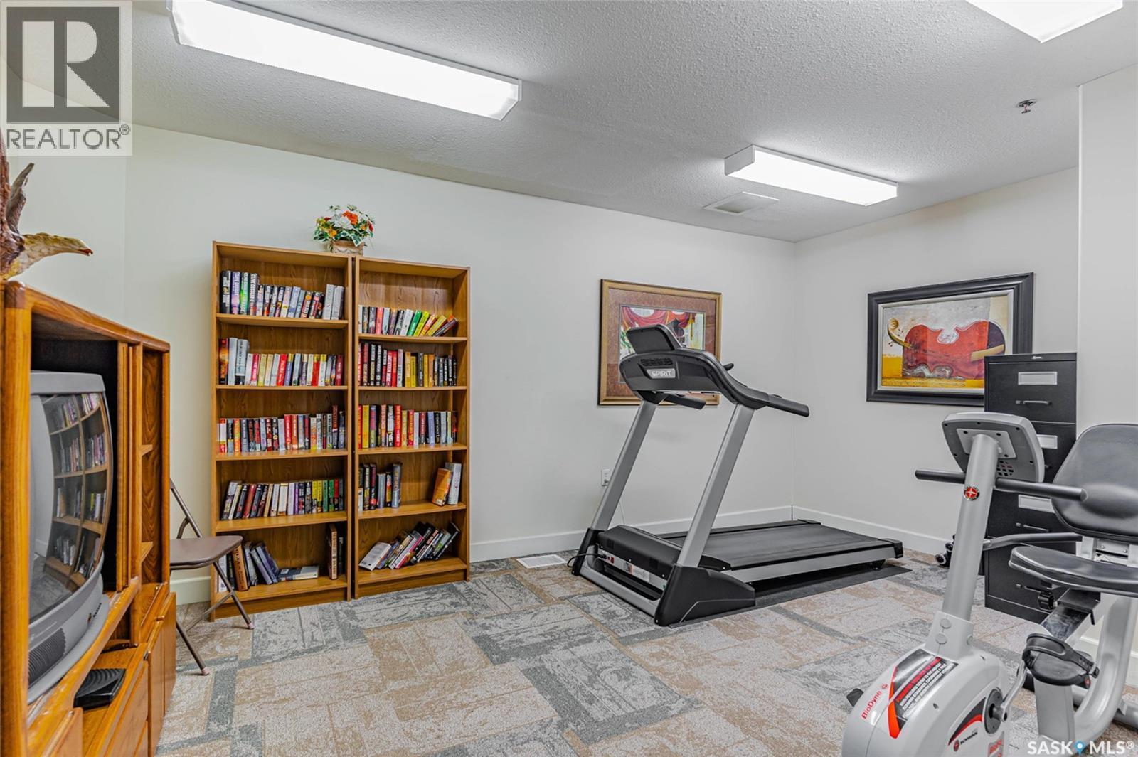 215 2213 Adelaide Street E, Saskatoon, SK - Indoor Photo Showing Gym Room