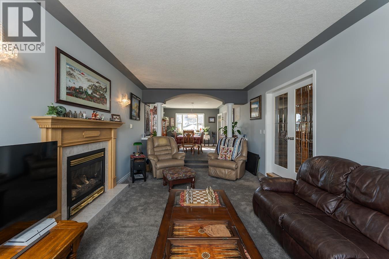 3022 Christopher Crescent, Prince George, BC - Indoor Photo Showing Living Room With Fireplace