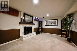 Basement Recreation room with wood burning fireplace -