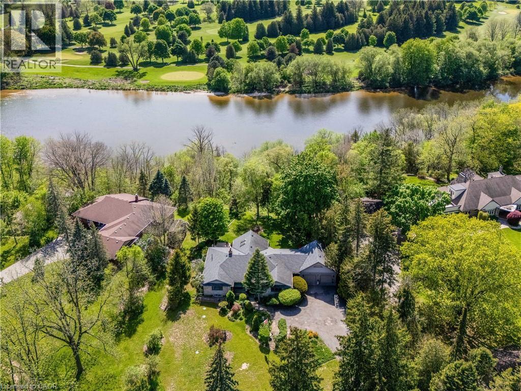 Aerial perspective showcasing a single-story residence with a multi-gabled roofline - 91 Limerick Drive, Kitchener, ON - Outdoor With Body Of Water With View